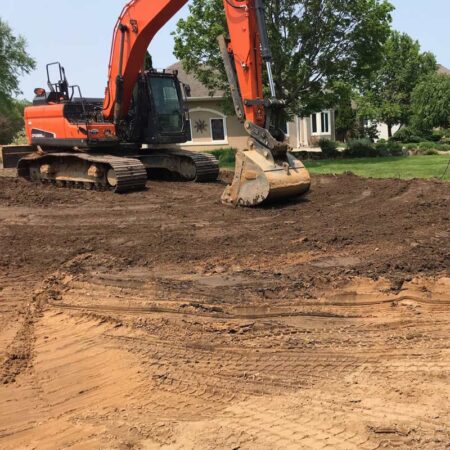 excavating services - excavator on job site