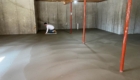 man finishing new basement floor