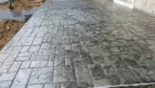 stamped concrete patio with brick pattern