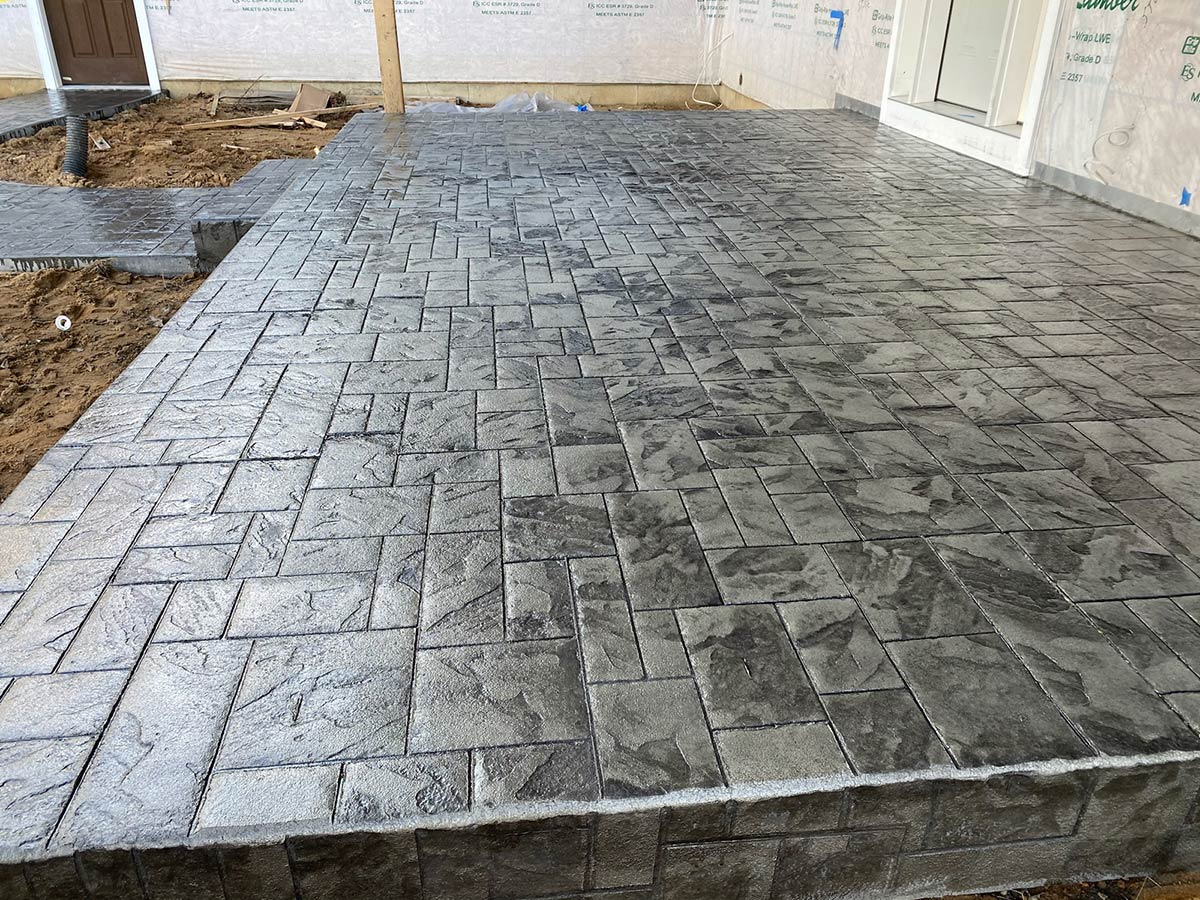 stamped concrete patio with brick pattern
