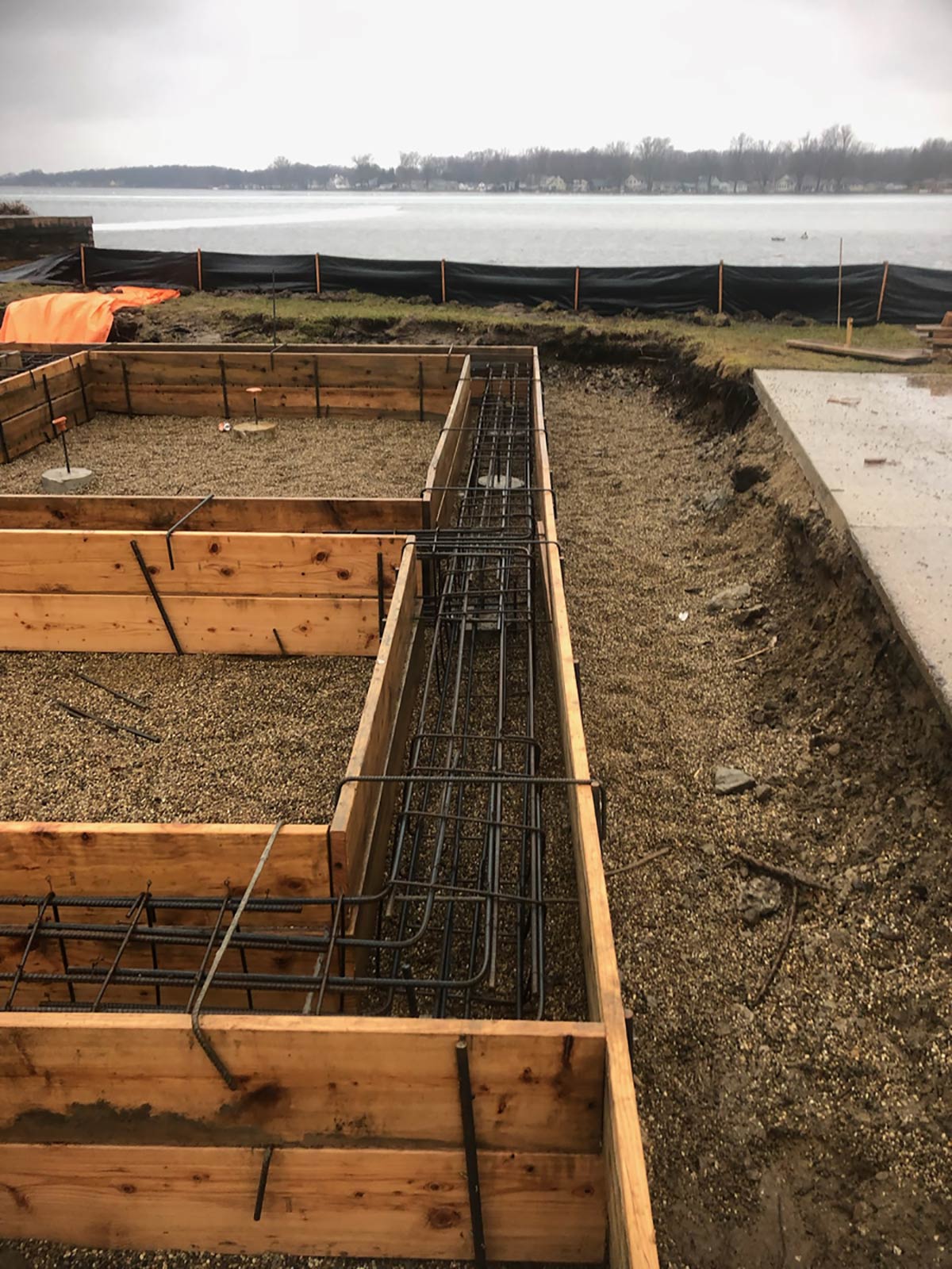 footings reinforced with rebar ready to be poured with concrete