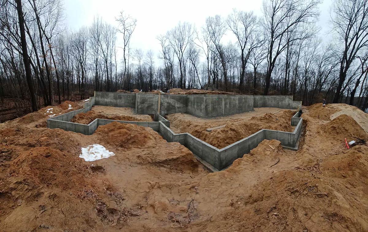 excavated job site with new foundation