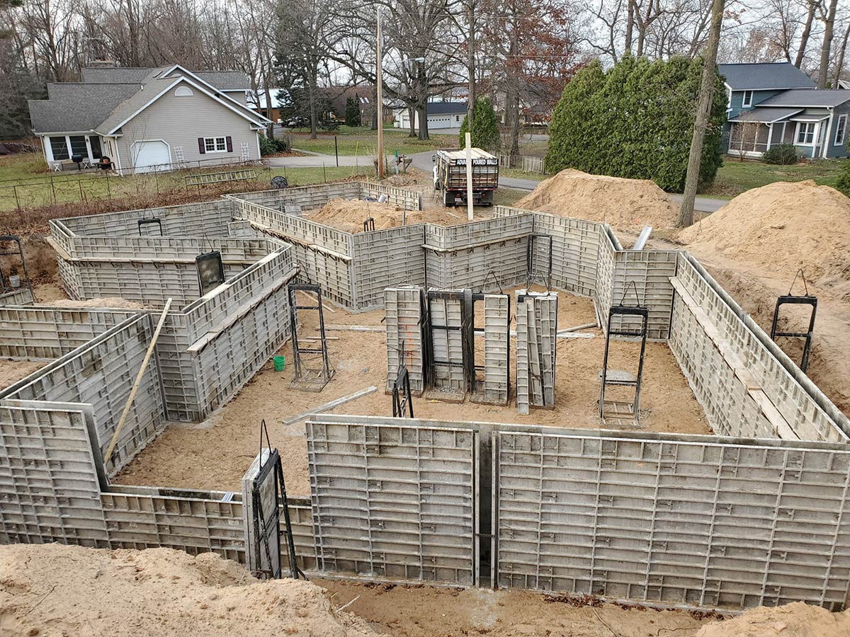 forms set up at job site for complex foundation for new house
