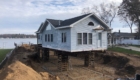 raised house held up over new footings