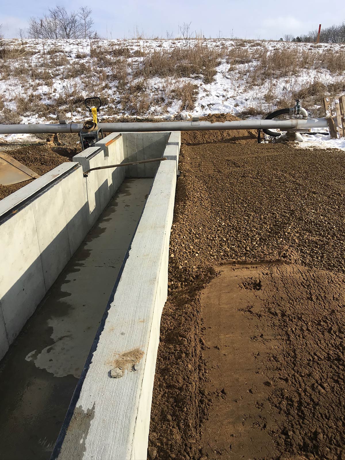 reinforced concrete channel to go under under train tracks